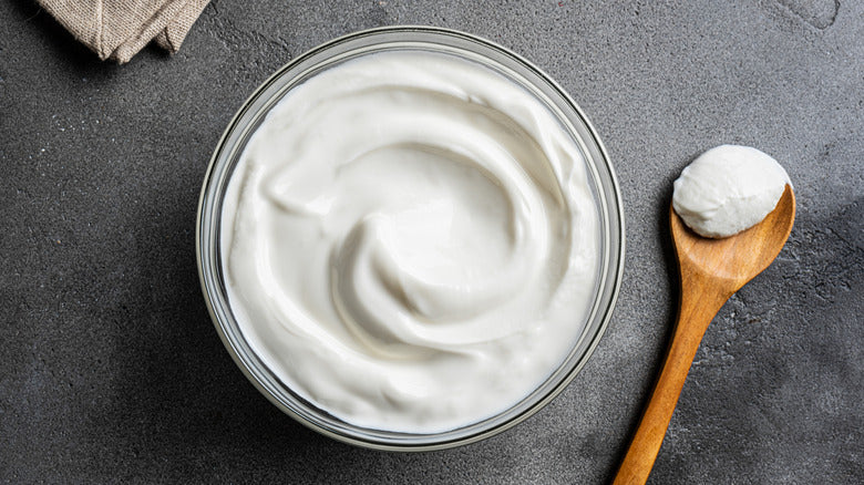 Why Yogurt Is The Only Marinade Base You'll Ever Need (And What's Actually In Those Bottles)